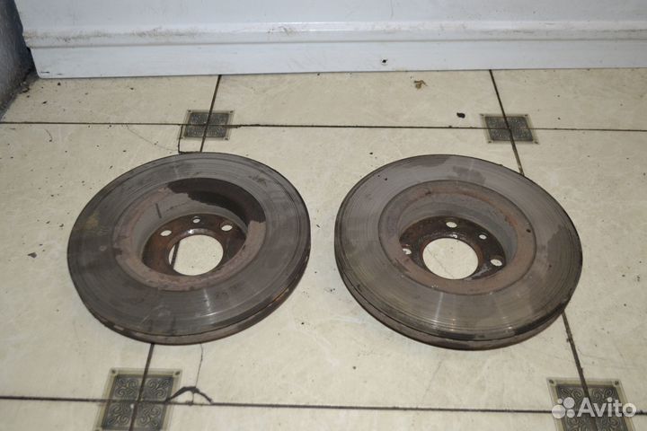 Тормозной диск передний Nissan Almera G15