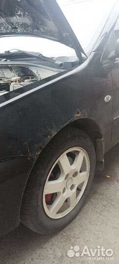 Крыло переднее левое lancer 9