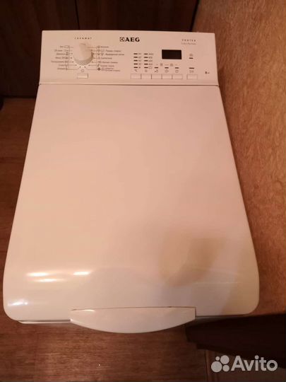 Стиральная машина с вертикальной загрузкой