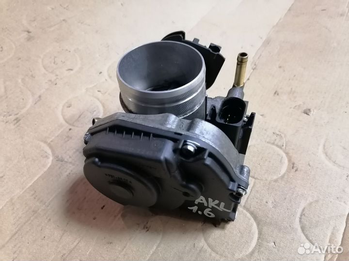 Дроссельная заслонка Audu,VW,VAG 06A133064J