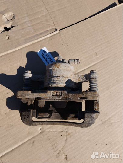 Суппорт передний правый Chevrolet Aveo T200