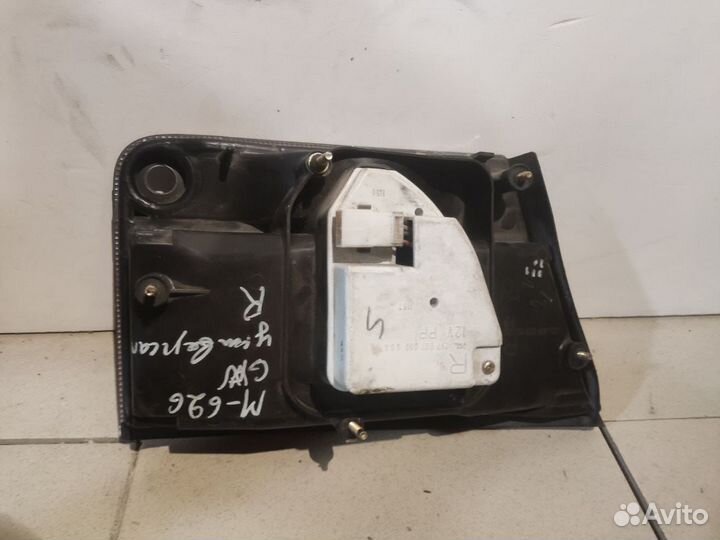 Фонарь mazda capella gw8w