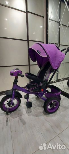 Велосипед с ручкой фиолетовый, модель такая же