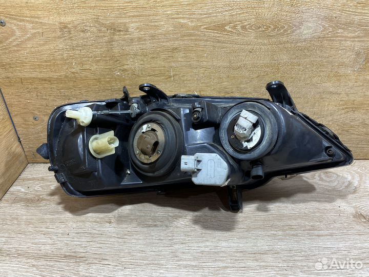 Фара передняя левая Opel Astra G 142299