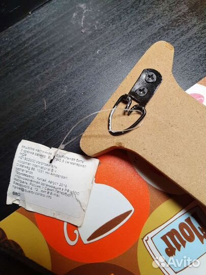 Вешалка стилизована под биту для лапты