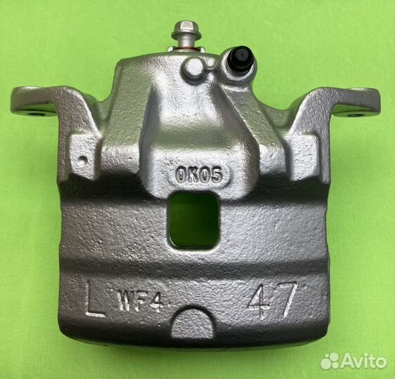 Nissan Tiida LADA Vesta Largus тормозной суппорт