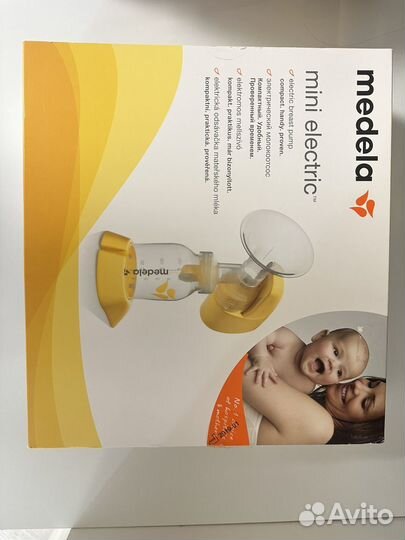 Молокоотсос medela электрический
