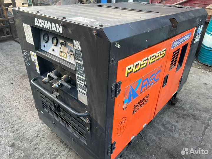 Компрессор с отбойными молотками