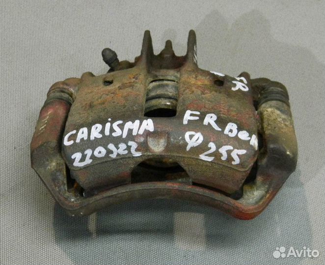 Суппорт передний правый Carisma