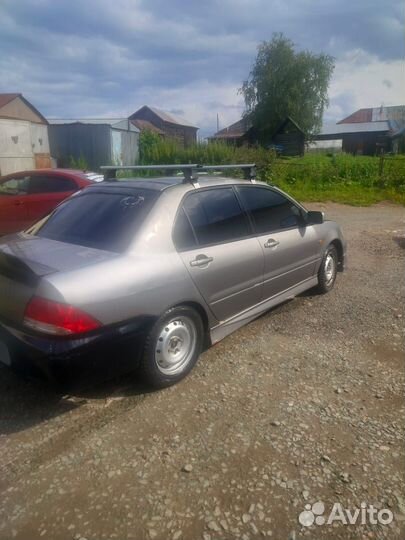 Mitsubishi Lancer Cedia 1.5 МТ, 2001, 150 000 км