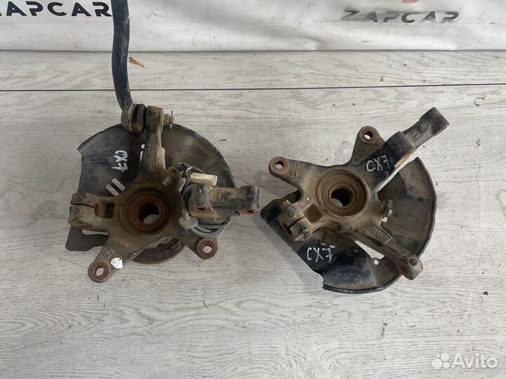 Mazda CX-7 Цапфа передня (R,L)