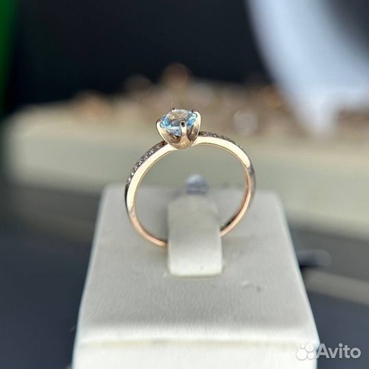 Золотое кольцо с топазом 585 проба
