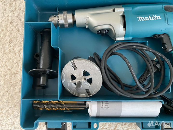 Ударная дрель Makita HP2050