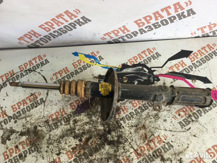 Тойота Камри Амортизатор задний левый