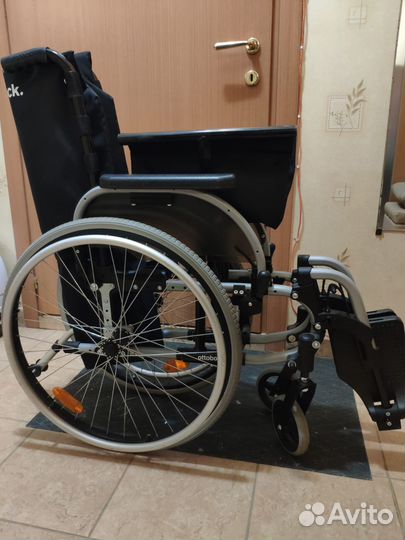 Инвалидная коляска