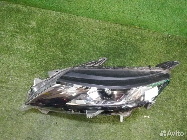 Фара левая Mitsubishi L200