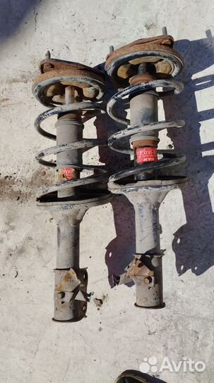 Передние стойки Митсубиси лансер9