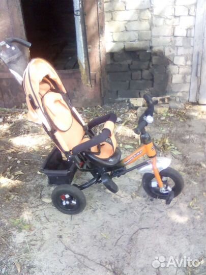 Детский трехколесный велосипед коляска