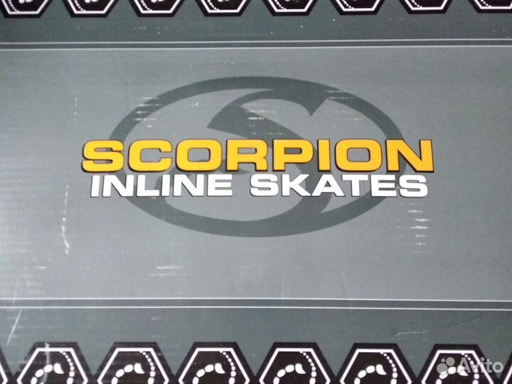 Роликовые коньки