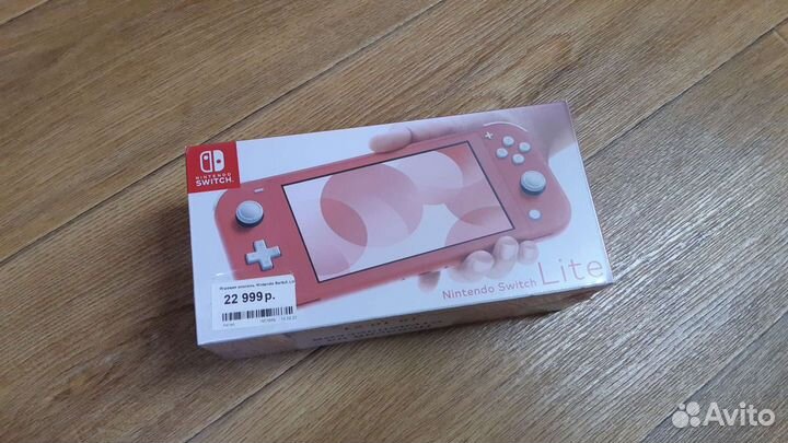 Продам Nintendo Switch coral новый