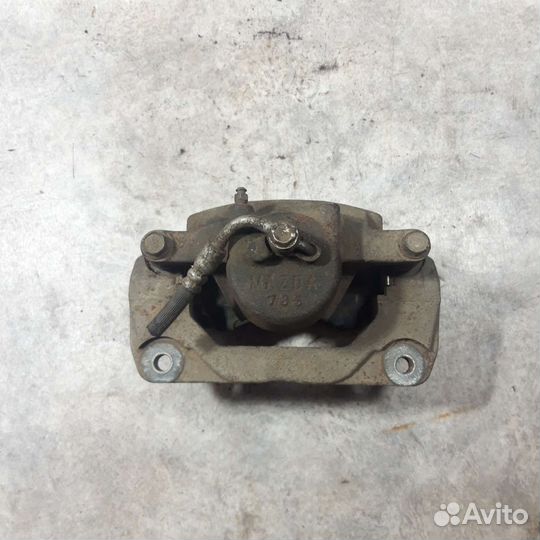 Супорт тормозной передний левый Мазда 6 GG 6 GH