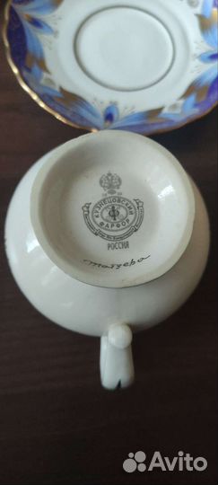 Фарфоровая кружка с блюдцем