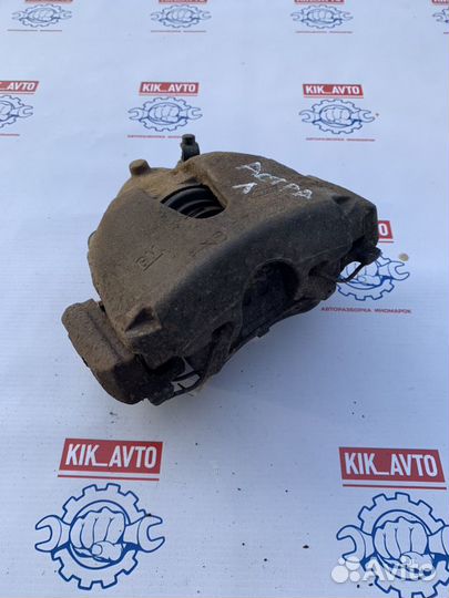 Суппорт тормозной передний правый левый Opel Astra