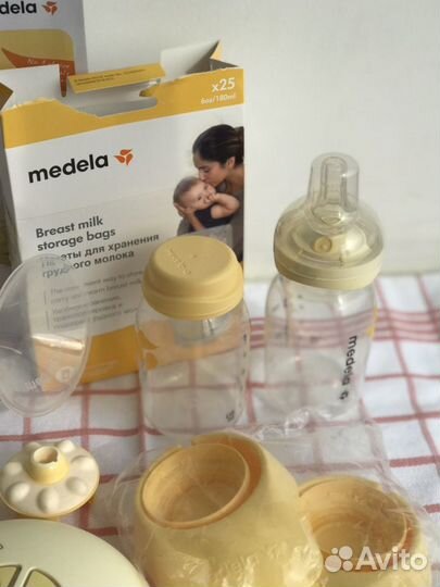 Двойной электрический молокоотсос Medela