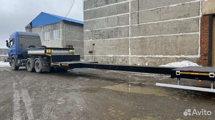 Полуприцеп трал (тяжеловоз) Авиком 98715-04 низкорамный раздвижной, 2024