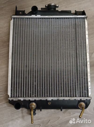 Радиатор охлаждения двигателя suzuki swift