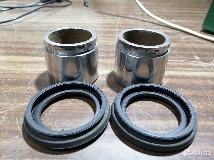 Поршень на передний супорт KIA Спектра. Оригинал