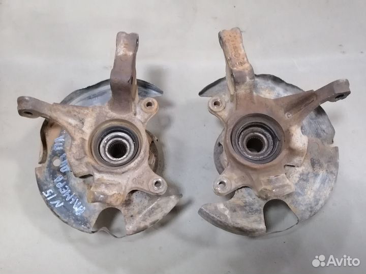 Кулак поворотн.перед.Nissan almera N15 CD20 1997