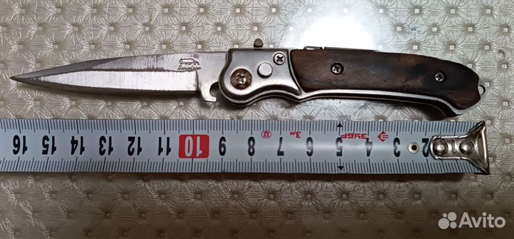 Нож складной с фонариком