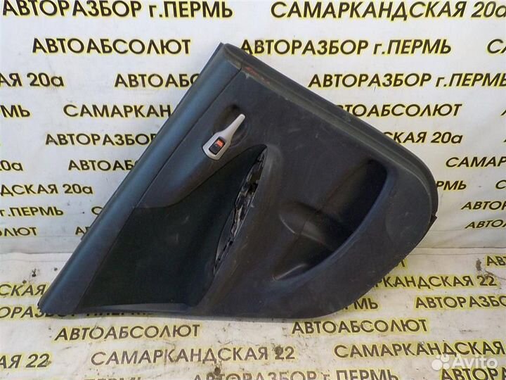 Обшивка двери задней левой Toyota Corolla (E150)