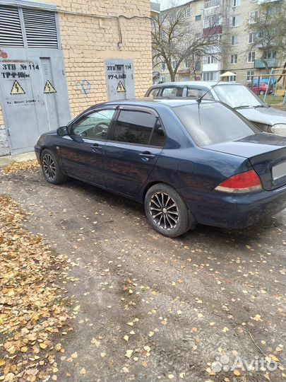 Mitsubishi Lancer 1.6 МТ, 2004, 220 000 км