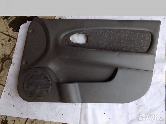 Обшивка двери передней правой Spectra 2001-2011