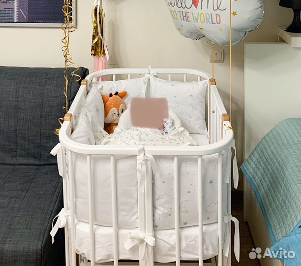 Детская кроватка с маятником