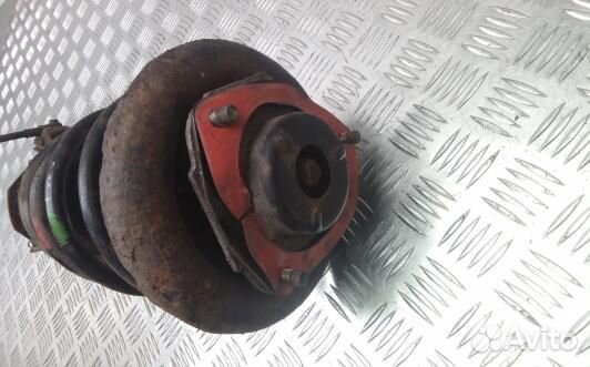 Стойка передняя левая nissan primera P12 (7OK20K501)