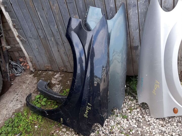 Крыло переднее Крайслер Вояджер 4 Додж Караван