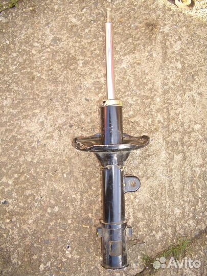 Амортизатор задний левый Хёндэ Туссан с04-10г