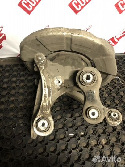 Кулак заднего левого колеса в сборе с ступицей BMW