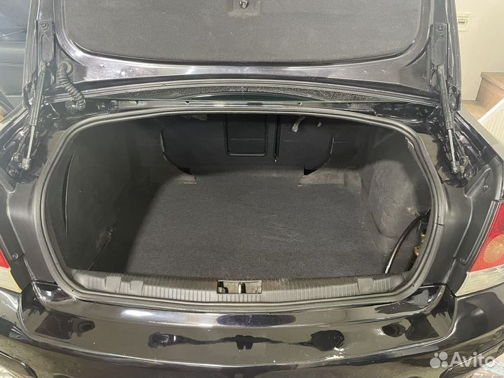 Обшивка багажника Opel Astra H седан