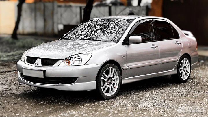 Накладка на передний бампер Лансер 9