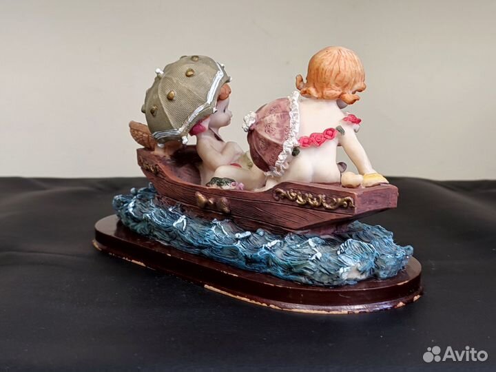 Статуэтка Дети в лодке с фруктами полистоун