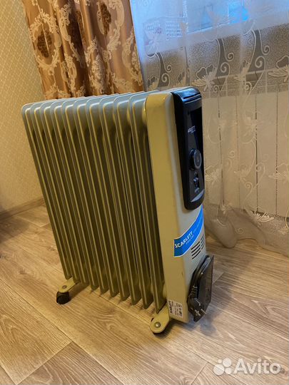 Масляный обогреватель