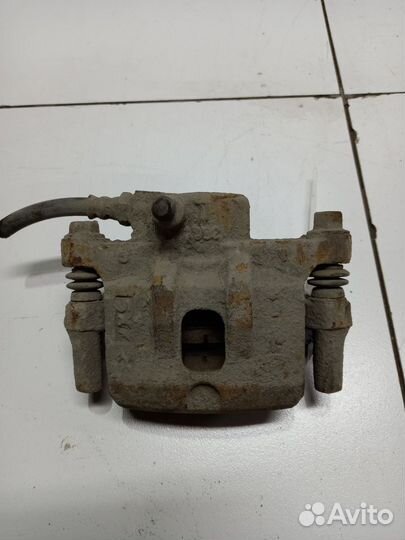 Mitsubishi Lancer lX суппорт тормозной задний лев