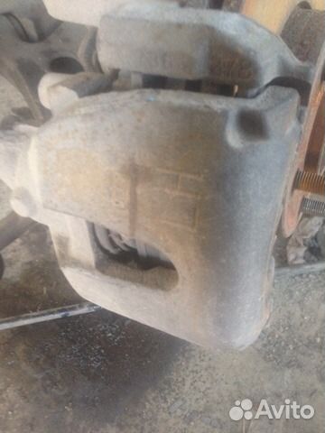 Суппорт тормозной задний левый Форд Фокус ll