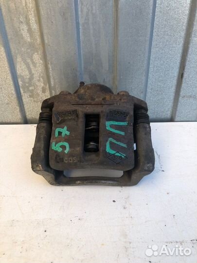 Суппорт тормозной передний правый Renault Logan