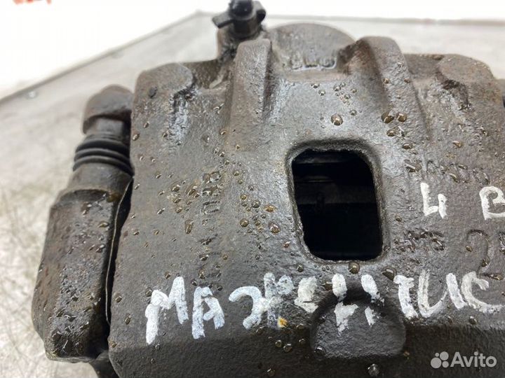 Суппорт тормозной передний левый Kia Magentis 2