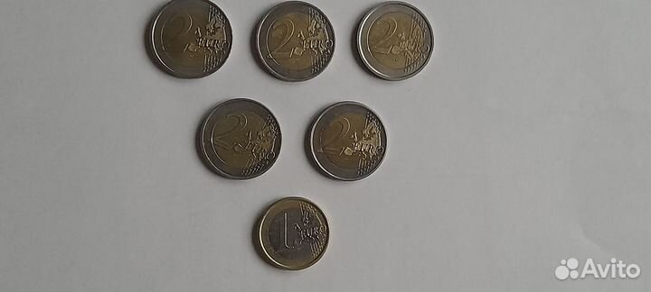 Монеты 1 евро и 2 евро